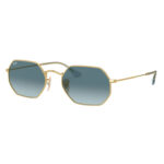 Ray-Ban RB3556N 91233M Octagonal montatura metallo dorato Arista Gold lenti blu sfumate gradient forma ottagonale